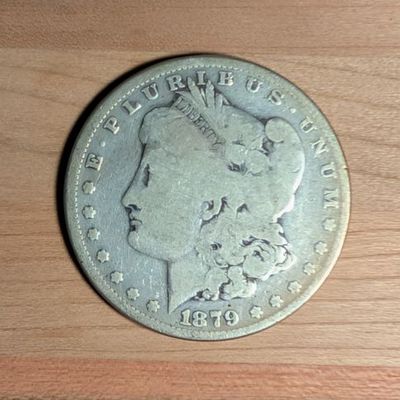 Sale Photo Thumbnail #312: 1879 US Morgan Silver Dollar