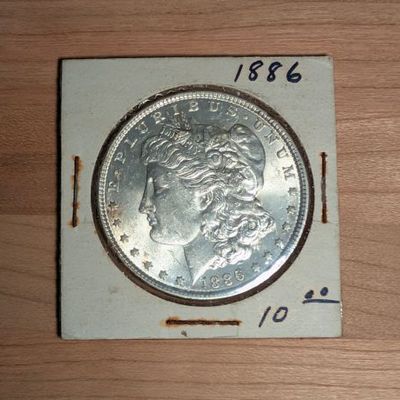 Sale Photo Thumbnail #309: US 1886 Morgan Silver Dollar