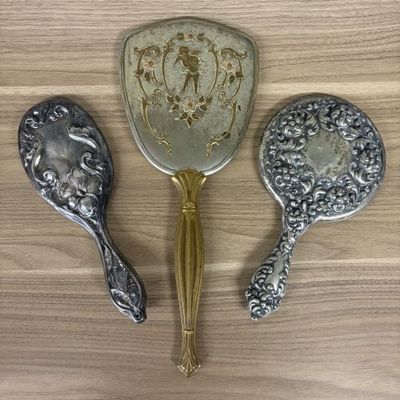 Sale Photo Thumbnail #80: A Trio of Vintage Silver-Plated and Gold-Tone Hand Mirrors and Brush Handle