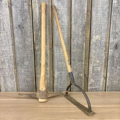 Sale Photo Thumbnail #517: Two Vintage Blue Grass Belknap Hardware Agricultural Tools Including a Pickaxe and a Weed Cutter