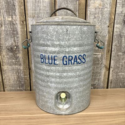 Sale Photo Thumbnail #524: Vintage Belknap Blue Grass 5 Gallon Galvanized Metal Water Cooler