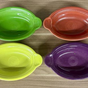 Sale Photo Thumbnail #354: A Set of Seven Homer Laughlin Fiesta Individual Oval Casserole Dishes