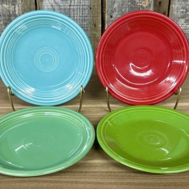 Sale Photo Thumbnail #150: A Set of Four Homer Laughlin Fiesta Glazed Earthenware Bread and Butter Plates