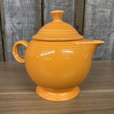 Sale Photo Thumbnail #138: Fiesta Tangerine Teapot and Lid by Homer Laughlin