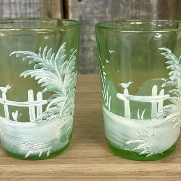 Sale Photo Thumbnail #69: A Pair of Antique Mary Gregory Green Glass Shot Glasses