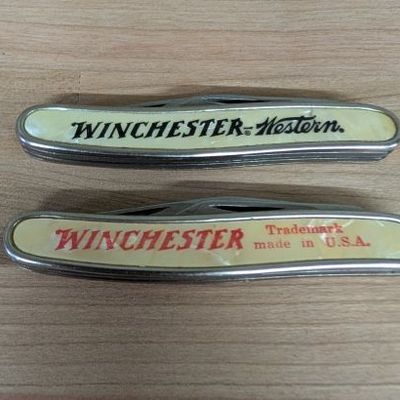 Sale Photo Thumbnail #281: A Pair of Colonial Winchester Western Advertising Pocket Knives