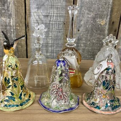 Sale Photo Thumbnail #72: An Assortment of Seven Decorative Porcelain, Glass, and Enameled Metal Bells