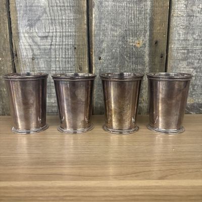 Sale Photo Thumbnail #99: A Set of Four Barker Ellis Silver Plated Patrick Henry Mint Julep Cups