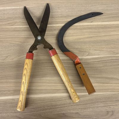 Sale Photo Thumbnail #509: A Trio of Vintage Manual Garden Tools Including a Belknap Blue Grass Bow Saw