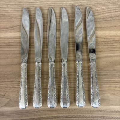 Sale Photo Thumbnail #429: A Set of Six Towle Sterling Silver Handled Dinner Knives in the Rambler Rose Pattern