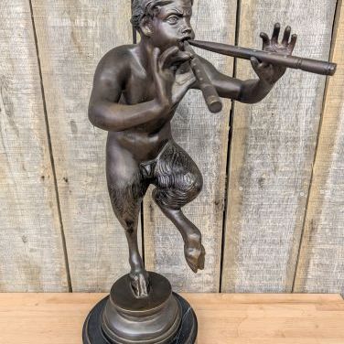 Sale Photo Thumbnail #177: Large Bronze Sculpture of a Dancing Faun Playing the Double Flute