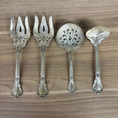 Sale Photo Thumbnail #101: A Set of Four Wallace Grand Baroque Sterling Silver Serving Pieces