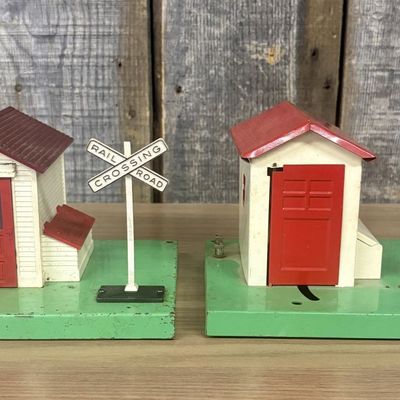 Sale Photo Thumbnail #561: A Pair of Lionel No. 45 and No. 45N Gateman Accessories