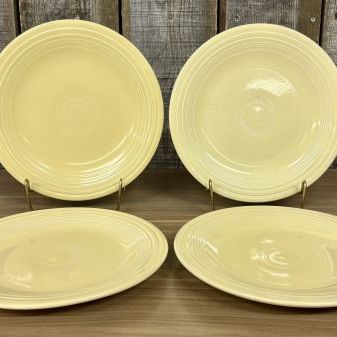 Sale Photo Thumbnail #347: A Set of Four Homer Laughlin Fiesta Yellow Dinner Plates