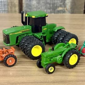 Sale Photo Thumbnail #81: Five Toy Vehicles Including Ertl John Deere Tractors and a Matchbox Lesney Road Roller