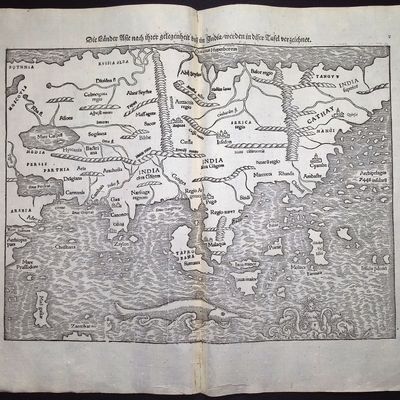 Munster, pub. 1574 - Map of India with Asia, Russia, some East Indies, Madagascar, Sea Monsters)