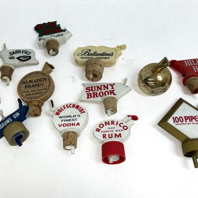 Sale Photo Thumbnail #464: VARIOUS BRANDS ADVERTISING BOTTLE POURERS PLASTIC MID-20TH CENTURY