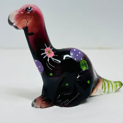 Sale Photo Thumbnail #207: FENTON AMETHYST GLASS DINOSAUR, LATE 20TH CENTURY