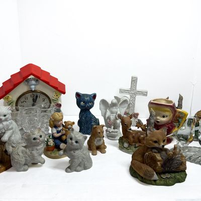 Sale Photo Thumbnail #384: A Collection of Decorative Figurines, Tableware, and a Ceramic Mantel Clock including Enesco Calico Kittens