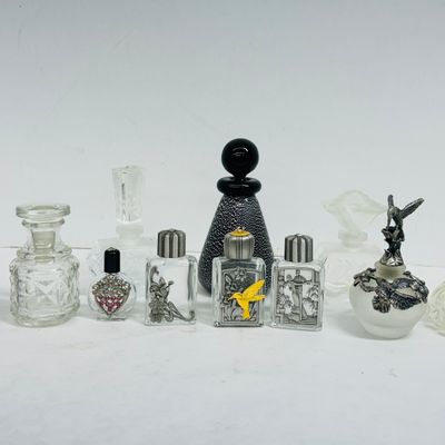Sale Photo Thumbnail #142: COLLECTION OF ELEVEN PERFUME BOTTLES