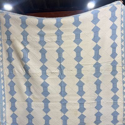 Sale Photo Thumbnail #368: BLUE AND WHITE COTTON SPOOL QUILT, MID-20TH CENTURY