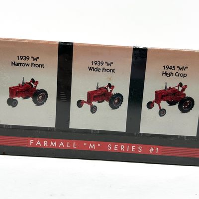 Sale Photo Thumbnail #350: Three Ertl 1/64 Scale Farmall M Series Number 1 Die-Cast Tractors
