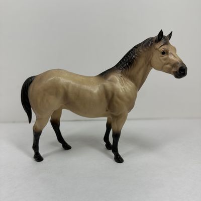 Sale Photo Thumbnail #386: BUCKSKIN ADIOS PLASTIC HORSE