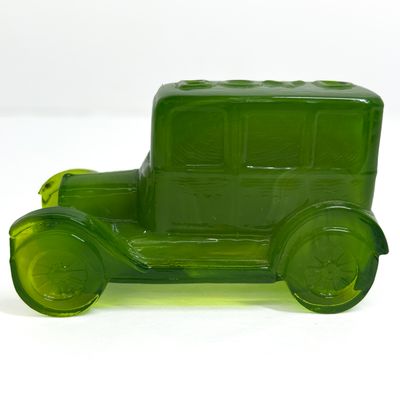Sale Photo Thumbnail #408: BOYD GREEN GLASS SEDAN FIGURINE, LATE 20TH CENTURY