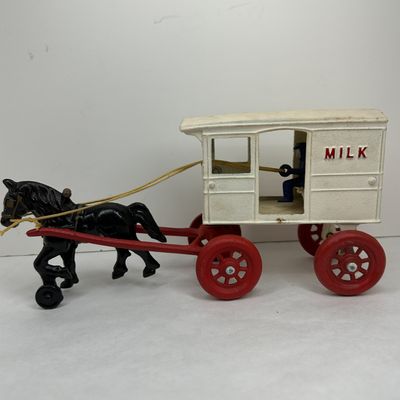 Sale Photo Thumbnail #385: KENTON CAST IRON MILK WAGON, 1920S