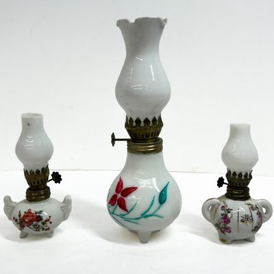 Sale Photo Thumbnail #437: THREE VINTAGE MINIATURE MILK GLASS LAMPS