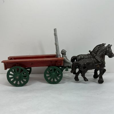 Sale Photo Thumbnail #390: STANLEY HORSE DRAWN METAL WAGON, 1940S