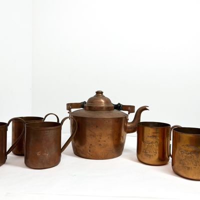 Sale Photo Thumbnail #402: A Six-Piece Finnish Copper Kettle and Mug Set by Sjoberg and Company