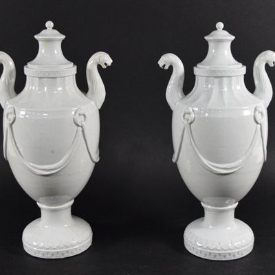 Sale Photo Thumbnail #60: A Pair of Neoclassical Style White Glazed Porcelain Panther Head Lidded Urns