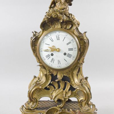 Sale Photo Thumbnail #154: Tiffany and Co. Gilt Brass Rococo Revival Mantel Clock