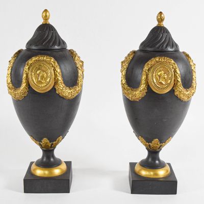 Sale Photo Thumbnail #138: A Pair of Mottahedeh Neoclassical Style Gilded Black Basalt Lidded Urns