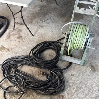 Garden Hoses And 2 Reels