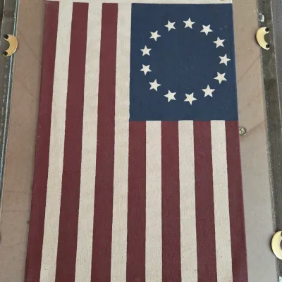 Framed "Runs with Thunder" print by Bev Doolittle with a vntage-style Betsy Ross 13-star American flag on the backside