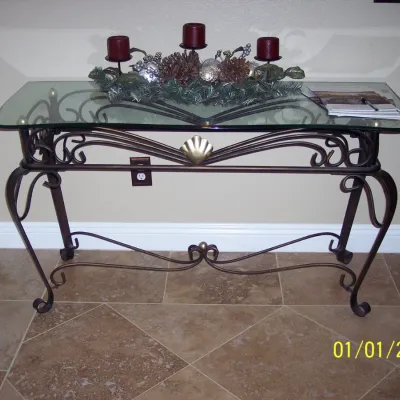 Wrought iron glass to top wall table $55 Candle display $15