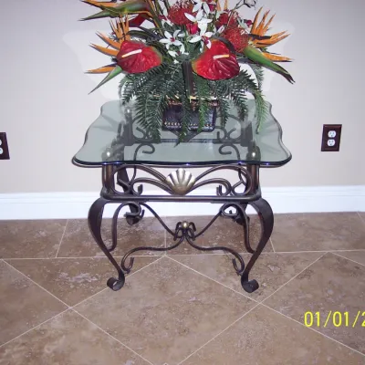 Wrought iron glass to top table $35