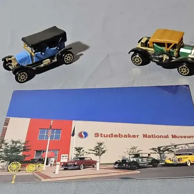 Two Miniature Classic Car Models No. 301 & No. 304, with Studebaker Museum Postcard