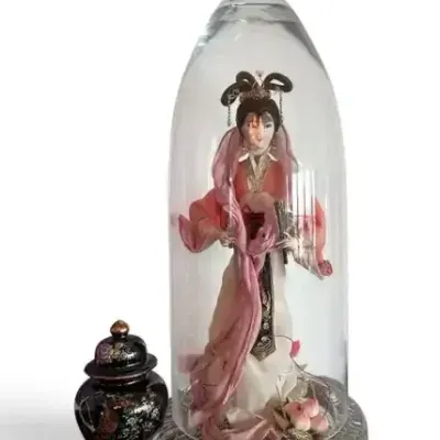Asian Decorative Doll Under Glass Dome with Lidded Vase