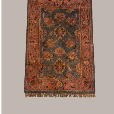 Rust and Charcoal Floral Rug – Warm earthy tones and stylized floral motifs make this a great option for a cozy, collected interior.