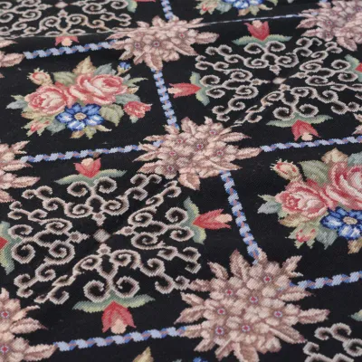 Black Floral Rug Detail – Bold oversized florals stand out beautifully against a dramatic black background.