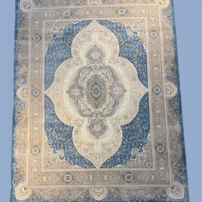Blue and Ivory Medallion Area Rug – A soft blue field with an elegant ivory medallion and detailed traditional patterning.