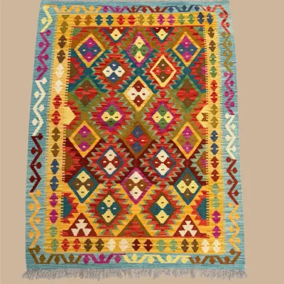 Colorful Geometric Rug – Bright jewel tones and repeating geometric motifs create a lively, eclectic design.