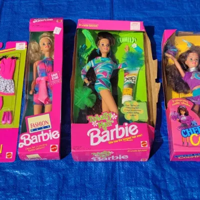 A3 1990s barbie dolls and accessories in original boxes