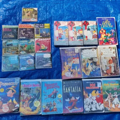 Lot of disney vhs tapes and view mater slides