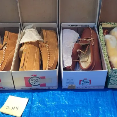 A4 pairs of moccasin slippers