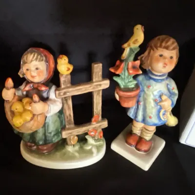 Two girls hummel figurines