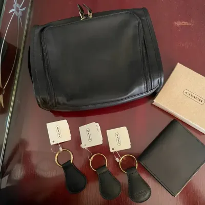 Lot of new coach wallet toiletries bag and three key chains